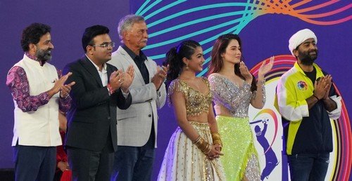 Ahmadabad : Chairman of Indian Premier League (IPL) Arun Singh Dhumal, BCCI Secretary Jay Shah, BCCI President Roger Binny, Bollywood actors Rashmika Mandhana, Tamannah Bhatia and singer Arijit Sing stand by the trophy during the opening ceremony of the first IPL match between Gujarat Titans and Chennai Super Kings at Narendra Modi Stadium in Ahmedabad on Friday, March 31, 2023. (PHOTO: IANS/Siddharaj Solanki)
